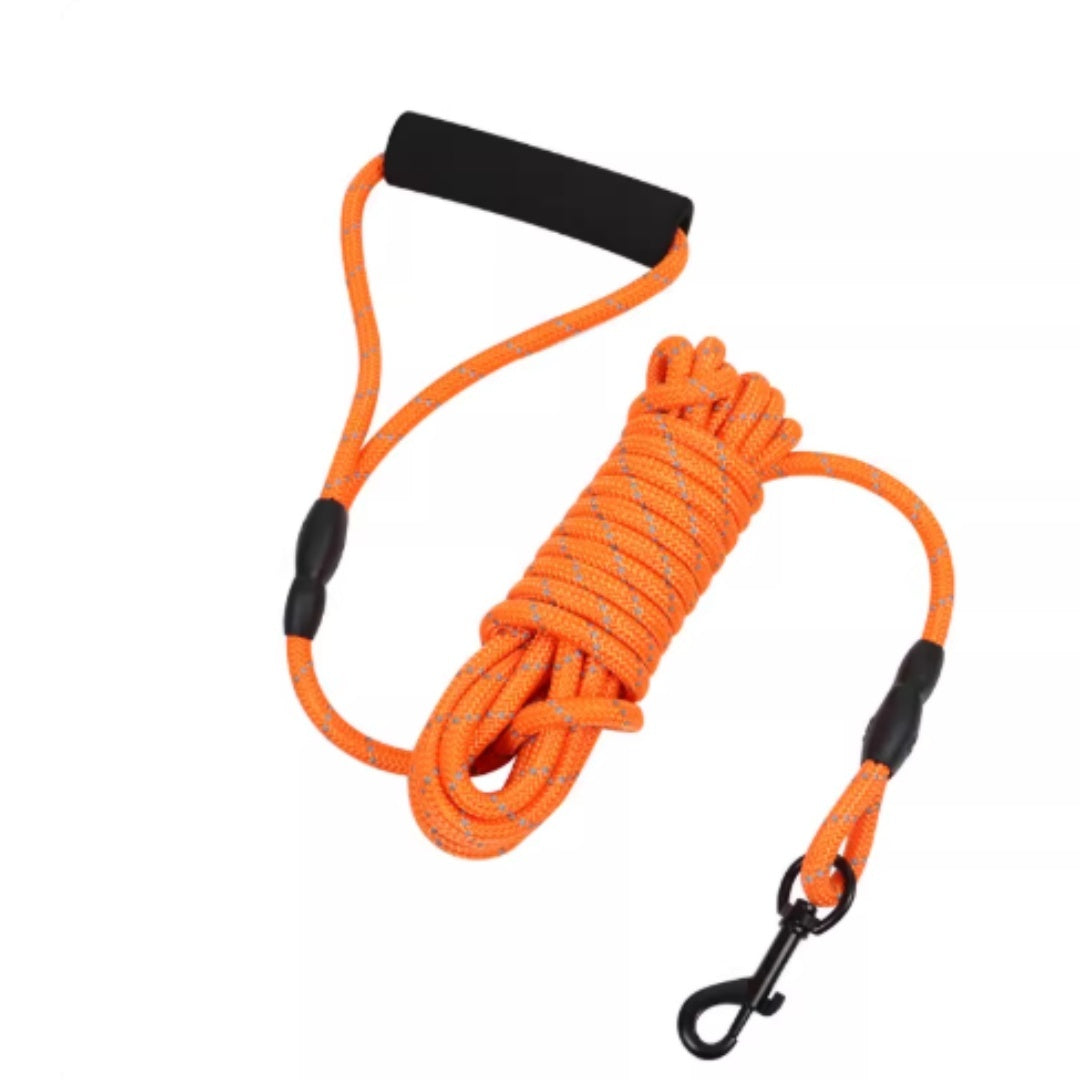 Orange rope leash with black connectors on a white background