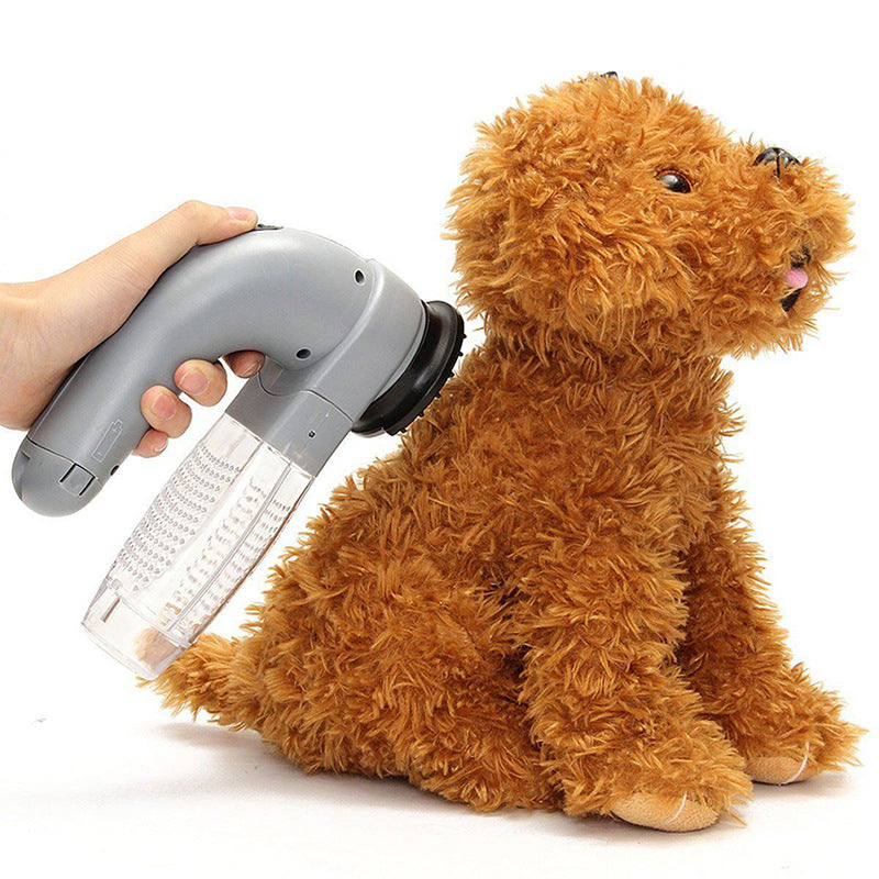 Handheld vacuum cleaner being used on a plush toy dog.