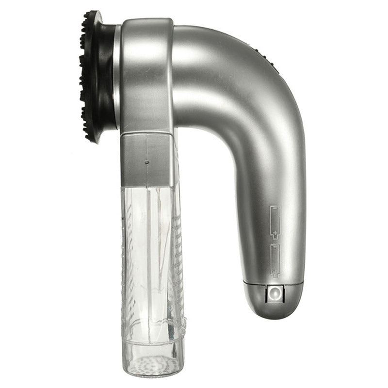 Handheld shower head with metallic and clear design on a white background
