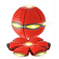 Red robot toy with glowing yellow eyes on a white background